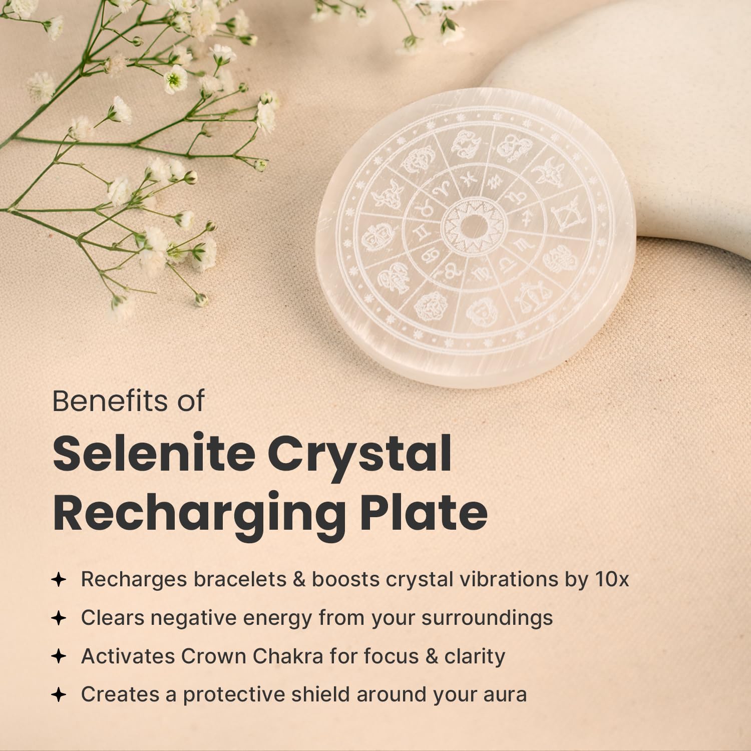 Minimalist spiritual decor: Large selenite plate on a wooden table.