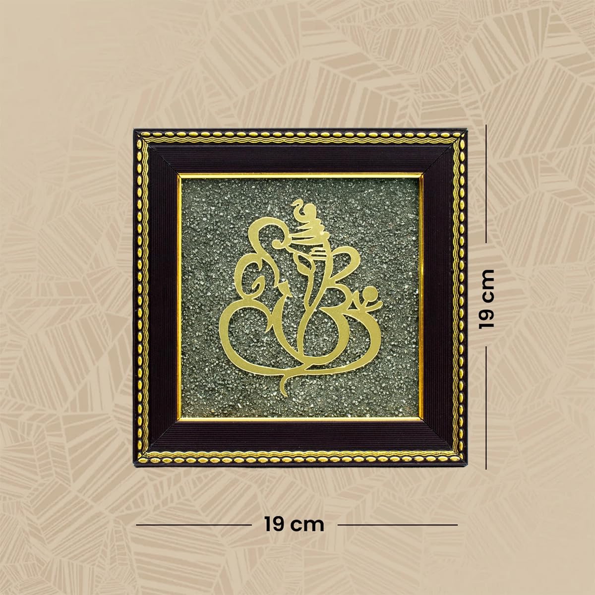 Close-up of Ganesha face on sparkling metallic pyrite stone